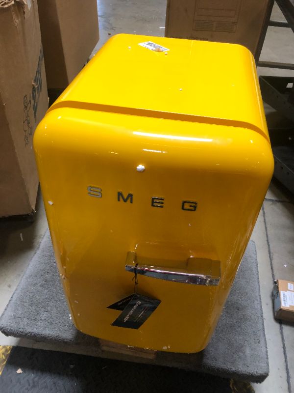 Photo 1 of Smeg FAB5URYW3 16" 50's Retro Style Series Compact Cooler with 1.5 cu. ft. Capacity Automatic Defrost LED Interior Lighting and Adjustable Shelves Yellow, Right Hand Hinge Made In Italy

