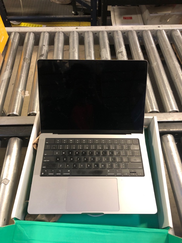 Photo 1 of Apple MacBook Pro 2021 with Apple M1 Pro chip (14-inch, 16GB RAM, 512GB SSD) - Space Gray (Renewed)