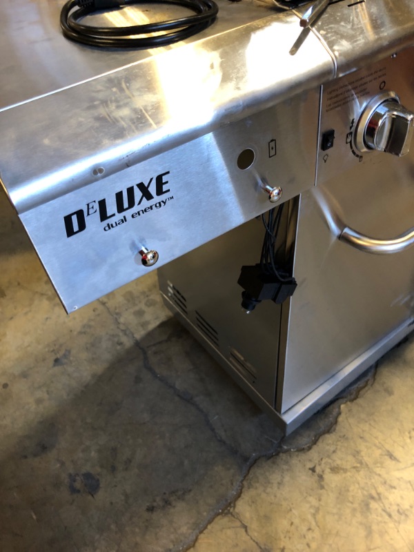 Photo 1 of Used-Major damager----Nexgrill Deluxe 6-Burner Propane Gas Grill with Ceramic Searing Side Burner, Stainless Steel Frame, Rotisserie Kit, 60,000 BTUs Output, BBQ Grill Perfect for Outdoor Gatherings - 720-0896X