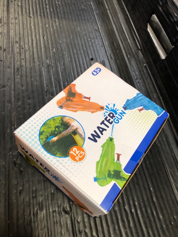 Photo 1 of 12 Packs Water Gun for Kids Squirt Toys Outdoor Beach Swimming Pool Game Summer Party Favor