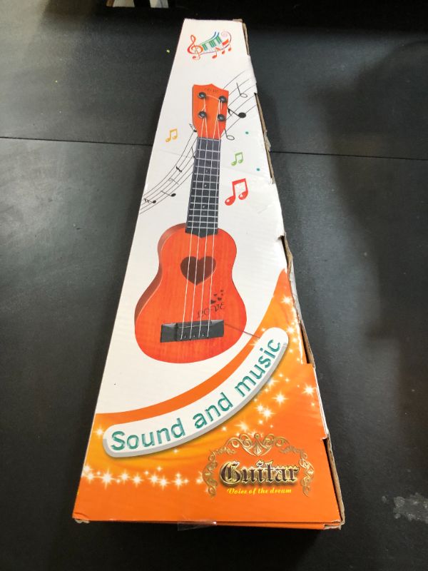 Photo 1 of YEZI Kids Toy Classical Ukulele Guitar Musical Instrument, Brown