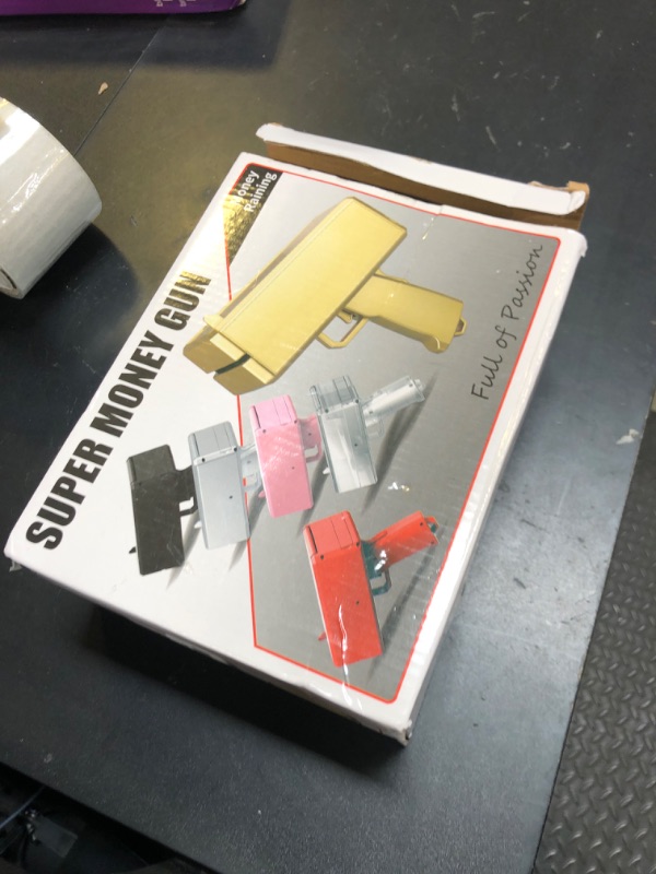 Photo 1 of Sopu Make it Rain Money Gun Paper Playing Spary Prop Cash Gun Party Supplies (Metallic Gold)