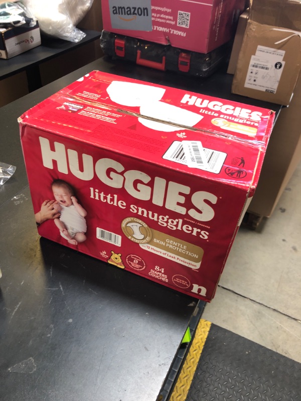 Photo 1 of Huggies Size Newborn Diapers, Little Snugglers Baby Diapers, Size Newborn (up to 10 lbs), 84 Count, Packaging May Vary