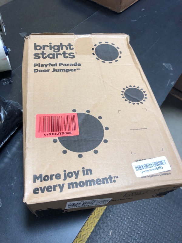 Photo 1 of Bright Starts Playful Parade Door Jumper for Baby with Adjustable Strap, 6 Months and Up, Max Weight 26 lbs