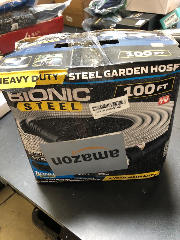 Photo 1 of Bionic Steel 100 Ft Garden Hose with Nozzle, 304 Stainless Steel Metal Water Hose 100Ft Long, NON Expandable Flexible Rust Proof Lightweight Heavy Duty, 3/4" Crush Resistant Fittings, Non Kink,500 PSI