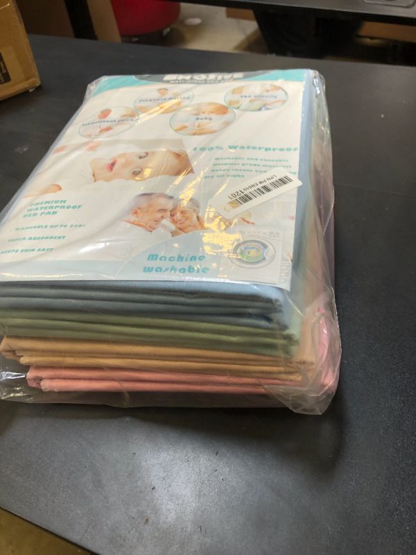 Photo 1 of MULTICOLOR PACK Brosive Waterproof Reusable Incontinence Bed Pads Washable Incontinence Underpads 8 Cups Absorbency,Mattress Protector for Adults, Kids and Pets(34”x 36” inch 4 Pack)