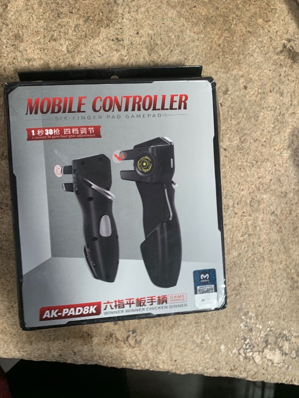 Photo 1 of HMHAMA Tablet Game Joystick Trigger Handle Game Controller Gamepad L1R1 Trigger Aim Button Six Finger Game Joystick Fits For ipad Android Tablet PUBG Game Accessories