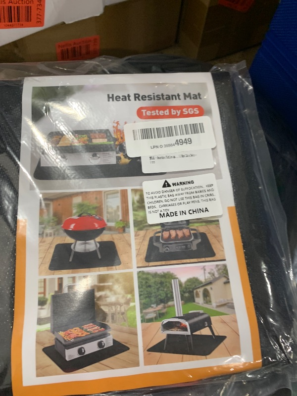 Photo 1 of 24x24in Heat Resistant Grill Mats for Outdoor Tabletop Grill to Protect Your Prep Grill Table, Heat Resistant Mats for Countertop, Fireproof & Water Proof & Oil Proof Tabletop Fire Pit Mat-Black-1mm