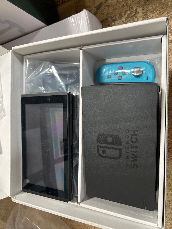 Photo 1 of *** SEE NOTES ****Nintendo Switch™ with Neon Blue and Neon Red Joy?Con™