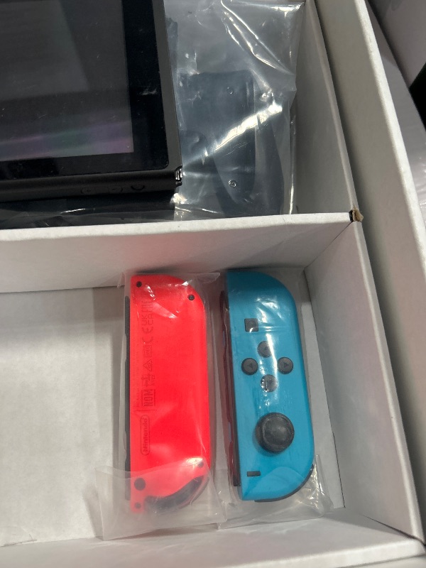 Photo 1 of *** SEE NOTES ****Nintendo Switch™ with Neon Blue and Neon Red Joy?Con™