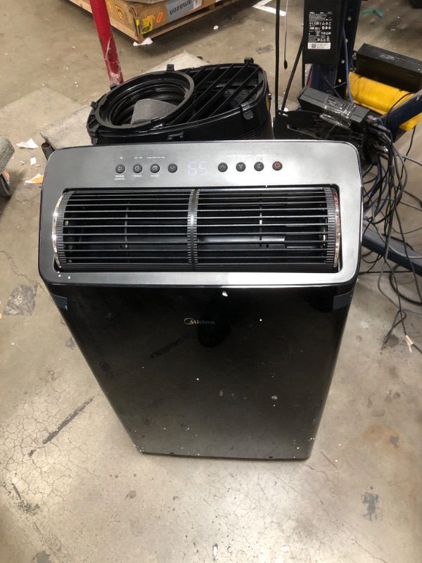 Photo 1 of ***************Stops infrequently.. doesn’t work properly**************
Midea Duo 12,000 BTU (10,000 BTU SACC) High Efficiency Inverter, Ultra Quiet Portable Air Conditioner, Cools up to 450 Sq. Ft., Compatible with Alexa/Google Assistant, Includes Remote
