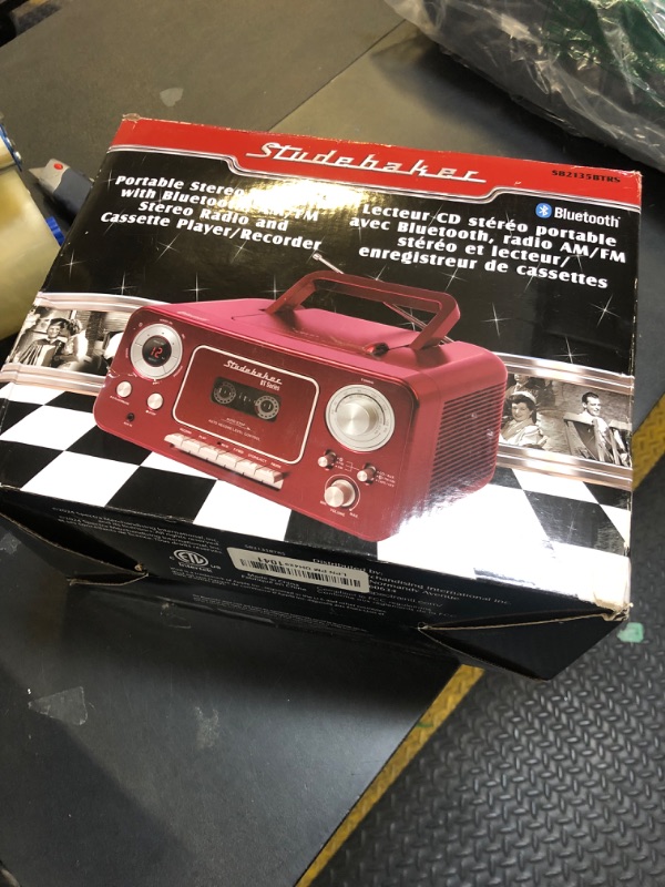 Photo 1 of Portable Stereo CD Player with Bluetooth, AM/FM Stereo Radio and Cassette Player/Recorder (Red & Silver)