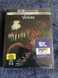 Photo 1 of Venom [SteelBook] [Includes Digital Copy] [4K Ultra HD Blu-ray/Blu-ray] [Only @ Best Buy] [2018]