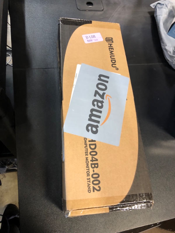 Photo 1 of HEMUDU Dual Monitor Articulating Desk Mount Arm Stand - Vertical Stack Screen Supports Two 13 to 34 Inch Computer Monitors with C Clamp