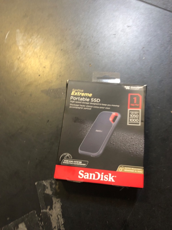 Photo 1 of SanDisk 1TB Extreme Portable SSD - Up to 1050MB/s, USB-C, USB 3.2 Gen 2, IP65 Water and Dust Resistance, Updated Firmware - External Solid State Drive - SDSSDE61-1T00-G25