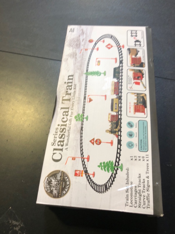 Photo 1 of JUQU Train Set-Electric Train Sets for Boys Toddlers Classical Train Toys,Battery-Powered Locomotive Engine with Sound and Lights, 3 Cars &10 Tracks, Christmas Toy Train for Age 3 4 5 6 Years Old Kids