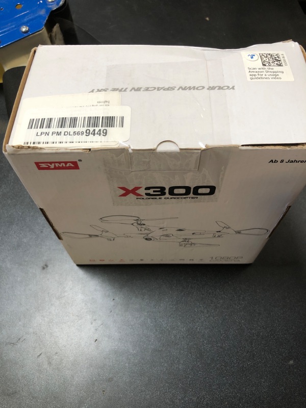 Photo 1 of SYMA Drone with 1080P FPV Camera,Optical Flow Positioning,Tap Fly,Altitude Hold,Headless Mode,3D Flips,2 Batteries 40mins Flying UFO Remote Control Quadcopter for Kids Beginners DAMAGED PKG
