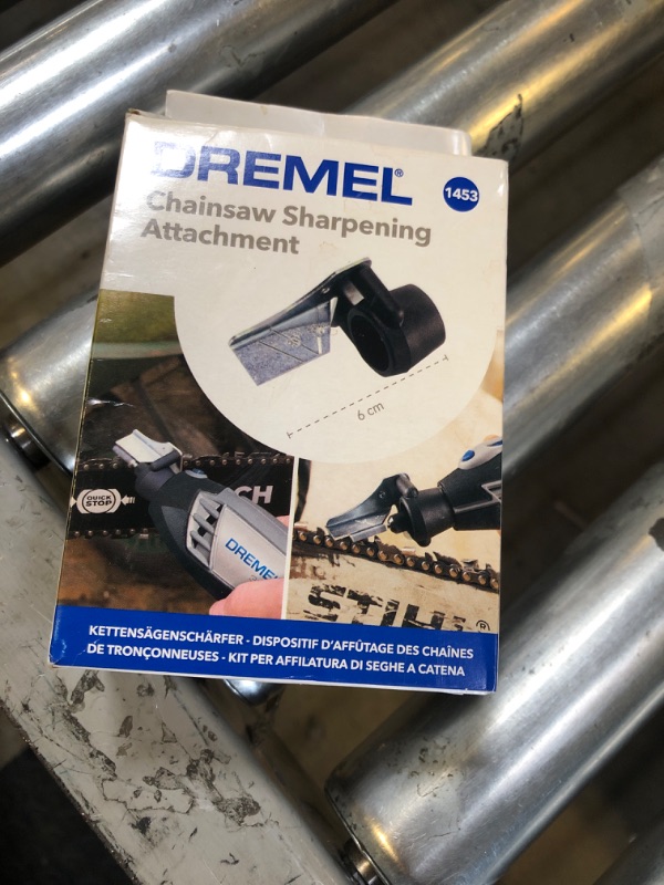 Photo 1 of Dremel 1453 Chainsaw Sharpening Kit, Rotary Tool Accessory Set with Sharpening Angle Guide Attachment and Grinding Stones