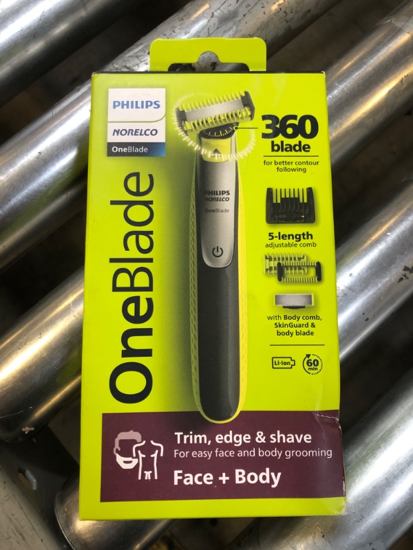 Photo 1 of Philips Norelco OneBlade 360 Face + Body, Hybrid Electric Razor and Beard Trimmer for Men with 5-in-1 Face Stubble Comb and Body Hair Trimmer Kit, QP2834/70