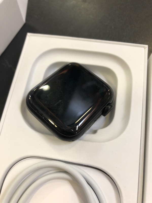 Photo 1 of Apple Watch SE (2nd Gen) [GPS 40mm] Smartwatch with Midnight Aluminum Case with Midnight Sport Band S/M. Fitness and Sleep Trackers, Crash Detection, Heart Rate Monitor, Retina Display