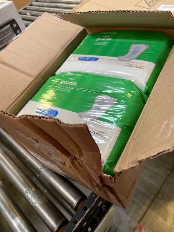 Photo 1 of Amazon Basics Men's Incontinence Guards, Maximum Absorbency, 104 Count, (2 Packs of 52)