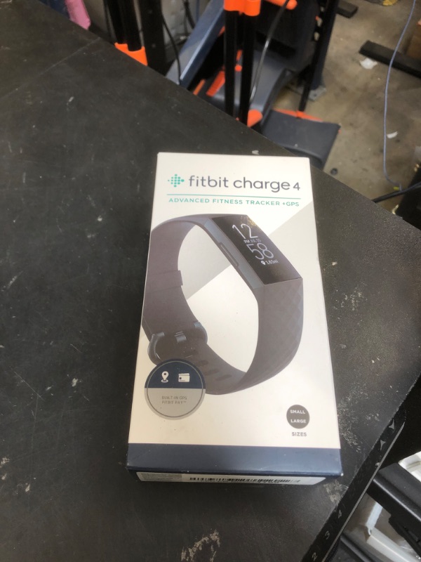 Photo 2 of Fitbit Charge 4 Black Advanced Fitness Tracker