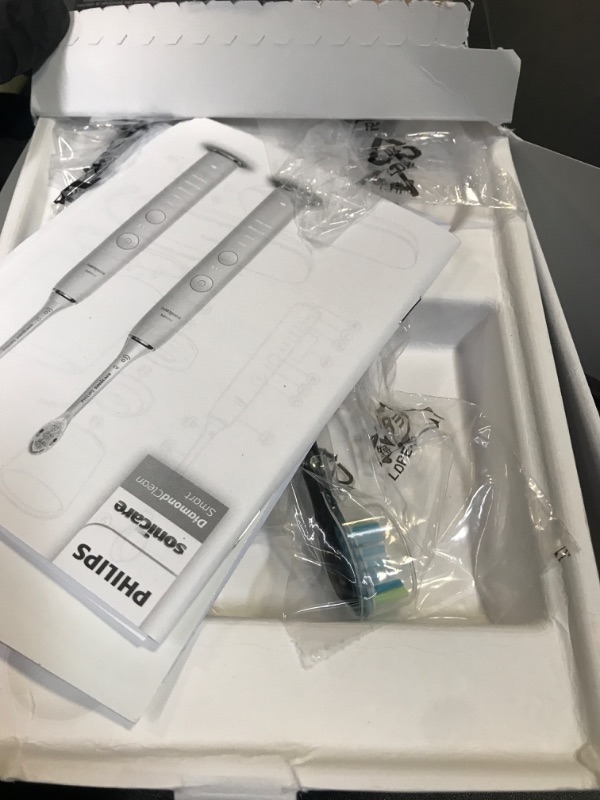 Photo 1 of Philips Sonicare DiamondClean Smart 9300 Electric Toothbrush, Sonic Toothbrush with App, Pressure Sensor, Brush Head Detection, 4 Brushing Modes and 3 Intensity Levels, Black, Model HX9903/15