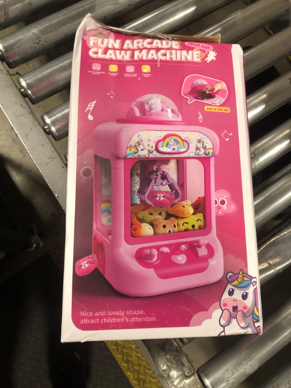 Photo 1 of PINK UNICORN FUN ARCADE CLAW MACHINE 