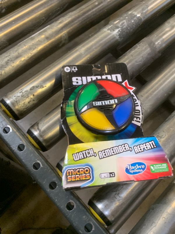 Photo 1 of Hasbro Gaming Simon Micro Series Electronic Game for 1 or More Players, Classic Simon Gameplay in a Compact Size, Fun Party Game for Kids Ages 8+