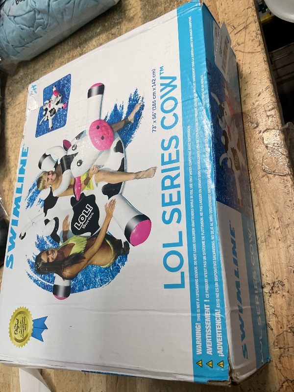 Photo 1 of SWIMLINE ORIGINAL 90268 Giant Inflatable LOL Cow Pool Float | Fun Ride-On Raft with Stable Legs & Wings |Lounge Floatie Ideal for Summer Gatherings