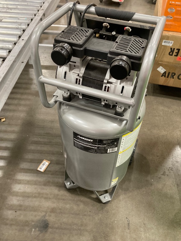 Photo 1 of ************DAMAGED INTERNAL PISTON****************
Husky 20 Gal.165 PSI Vertical Electric Oil-Free Quiet Auto/Workshop Air Compressor with Dual Gauges and 2-Quick Couplers