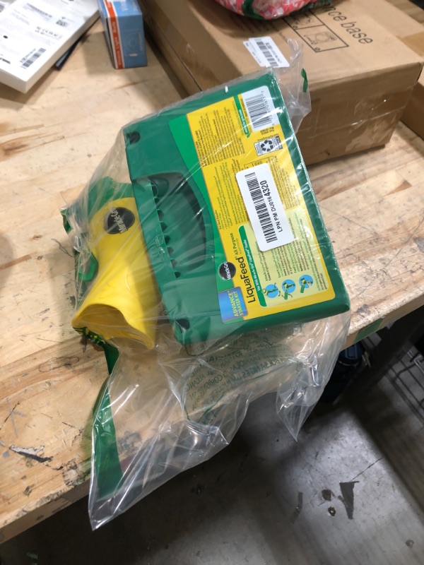 Photo 1 of *LIQUAFEED PLANT FOOD BOOTLE NOT INCLUDED* Miracle-Gro LiquaFeed All Purpose Plant Food Advance Starter Kit, For Flowers, Vegetables, Trees and Shrubs, One 16 oz. Plant Food and One Feeder