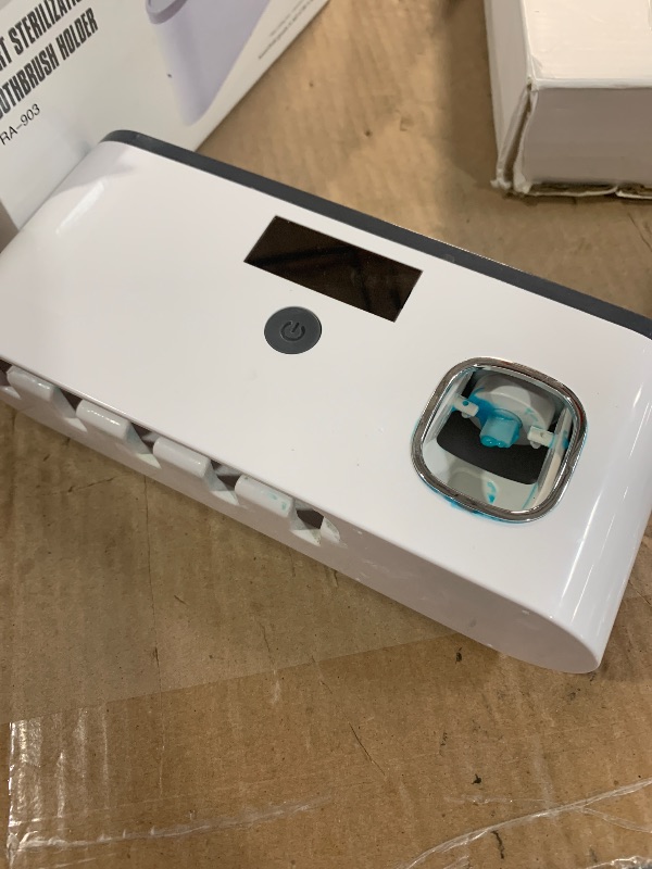 Photo 1 of (used)(incomplete) Toothbrush Holders for Bathrooms, Toothbrush Holder Wall Mounted with Toothpaste Dispenser Bathroom Solar Charging 