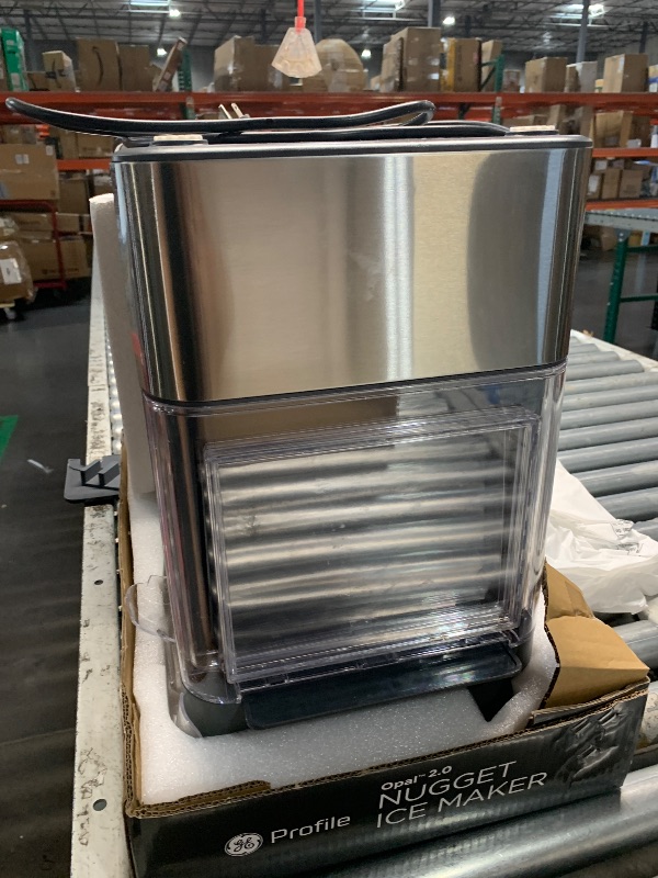 Photo 1 of **Prev used**Major damage***FOR PARTS ONLY***
GE Profile Opal 2.0 with 0.75 Gallon Tank, Chewable Crunchable Countertop Nugget Ice Maker, Scoop included, 38 lbs in 24 hours, Pellet Ice Machine with WiFi & Smart Connected, Stainless Steel