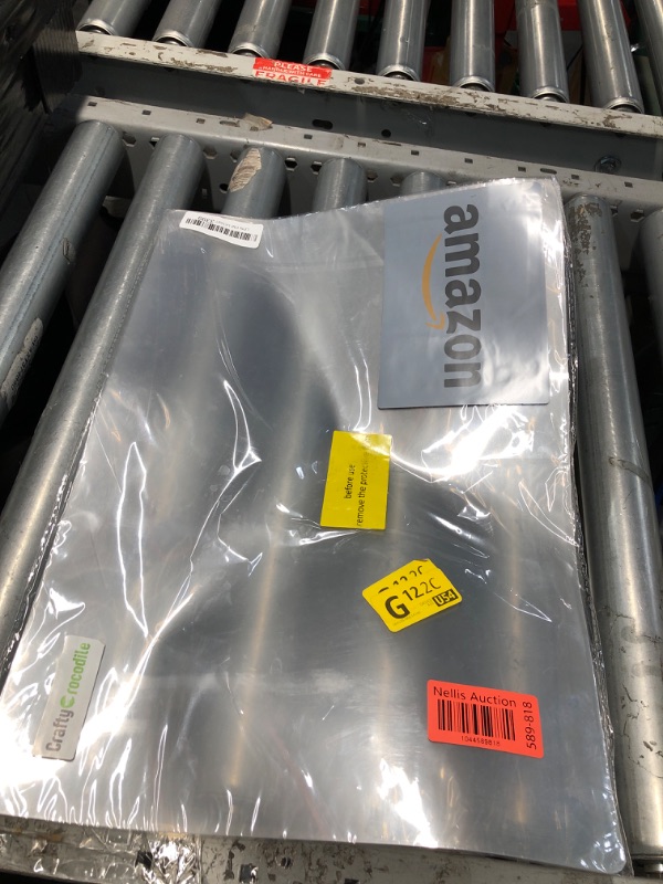 Photo 1 of ***(MAJOR DAMAGE/ SEE NOTES)***CraftyCrocodile Clear Plastic Placemats Set of 4 - Vinyl Table Protector for Dining, Kitchen, Office, Painting Table, Shelves - Heat Resistant, Crystal Clear, Wipeable Place Mats - 17.5x12