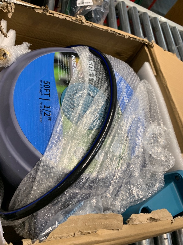 Photo 1 of Tuzoc Retractable Garden Hose Reel, Wall-Mounted Hose Reel 1/2 in x 50 ft, Slow Retraction System, Any Length Lock, 180°Swivel Water Hose Reel with 10 Function Nozzle