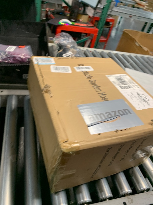 Photo 1 of Tuzoc Retractable Garden Hose Reel, Wall-Mounted Hose Reel 1/2 in x 50 ft, Slow Retraction System, Any Length Lock, 180°Swivel Water Hose Reel with 10 Function Nozzle