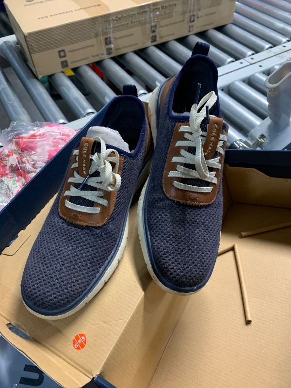 Photo 1 of ***(HEAVILY USED/ MINOR DAMAGE)***Cole Haan mens Generation Zerogrand Stitchlite Sneaker, Marine Blue/Gray Pinstripe Knit/Ch British Tan/Ivory, 9.5 US