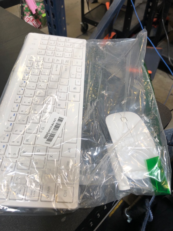 Photo 1 of Wireless Keyboard and Mouse Ultra Slim Combo, TopMate 2.4G Silent Compact USB 2400DPI Mouse and Scissor Switch Keyboard Set with Cover, 2 AA and 2 AAA Batteries, for PC/Laptop/Windows/Mac - White