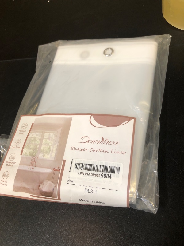 Photo 1 of downluxe Waterproof Clear Shower Curtain Liner - PEVA Lightweight Plastic Shower Liner with 3 Magnets, Shower Curtains for Bathroom, 72" x 72", Clear