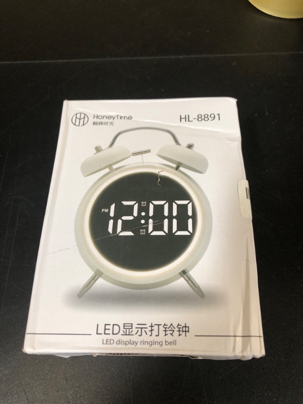 Photo 1 of Digital Small Alarm Clock, 4.5 Inch Double Bell Electronic LED Alarm Clock, Plug in or Battery Operated Silent Metal Table Clock, Bedside Loud Bell Clock for Heavy Sleepers Adults Kids (Silvery)