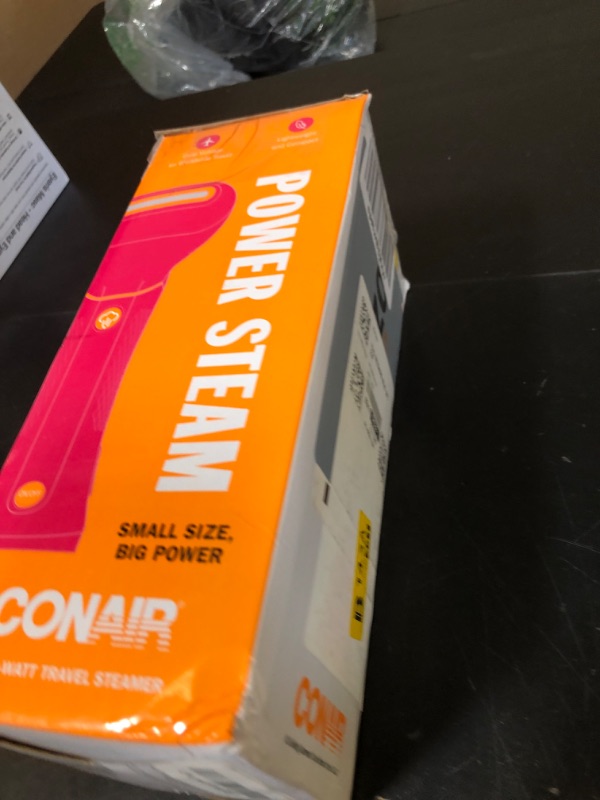 Photo 1 of Conair Handheld Garment Steamer for Clothes - Power Steam: Small Size, Big Power - Great for Home, Office, or Travel with Dual Voltage for Worldwide Use, Pink