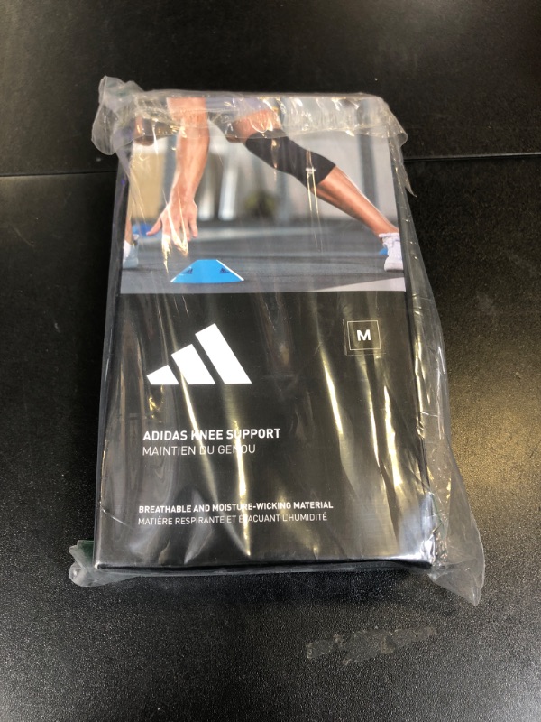 Photo 1 of adidas Knee Support Sleeve - Knee Sleeve for Support, Training, and Competitions - Ergonomic Design, Elastic Nylon Blend - Durable and Breathable - For all Fitness Levels - Medium
