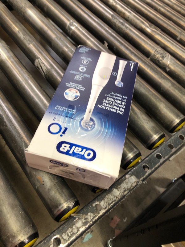 Photo 1 of Oral-B iO Series 2 Rechargeable Electric Powered Toothbrush Starter Kit, Pure White with 2 Brush Heads - Automatic Pressure Sensor to Protect Gums - 3 Modes - 2 Min Timer