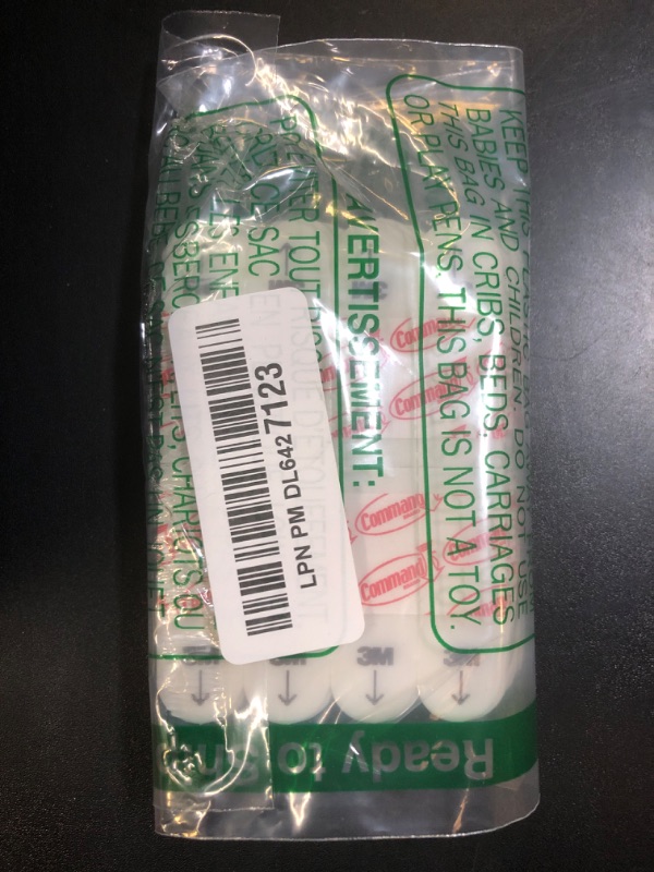 Photo 1 of Command Poster Strips, Damage Free Hanging Poster Hangers, No Tools Wall Hanging Strips for Posters, 256 White Command Adhesive Strips