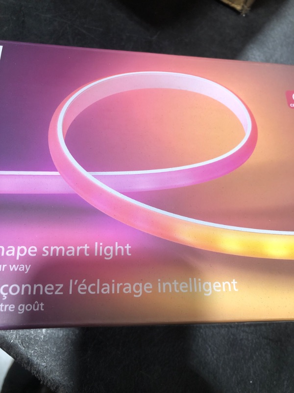 Photo 1 of Philips Hue Indoor 6-Foot Smart LED Light Strip Base Kit with Plug - Flowing Multicolor Effect - 1 Pack - Control with Hue App - Works with Alexa, Google Assistant and Apple HomeKit
