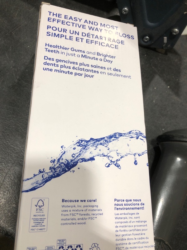 Photo 1 of Waterpik Cordless Pulse Rechargeable Portable Water Flosser for Teeth, Gums, Braces Care and Travel with 2 Flossing Tips, Waterproof, ADA Accepted, WF-20 Blue, Packaging May Vary