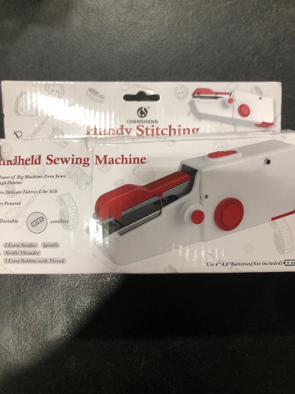 Photo 1 of Handheld Sewing Machine, Quick Sew Mini Portable Electric Sewing Machine For Beginners Adults, Easy To Use Suitable for Sewing Clothes, Family Travel, DIY