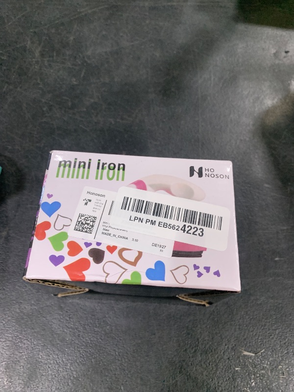 Photo 1 of Honoson Mini Craft Iron Mini Heat Press Small Portable Tiny Iron with Charging Base Accessories for Fuse Beads Patch DIY Shoes T-Shirts Heat Transfer Vinyl Projects(Green)