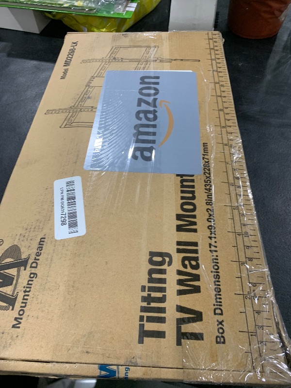 Photo 1 of Mounting Dream UL Listed TV Mount for Most 37-75 Inch TV, Universal Tilt TV Wall Mount Fit 16", 18", 24" Stud with Loading Capacity 132lbs, Max Vesa 600 x 400mm, Low Profile Flat Wall Mount Bracket